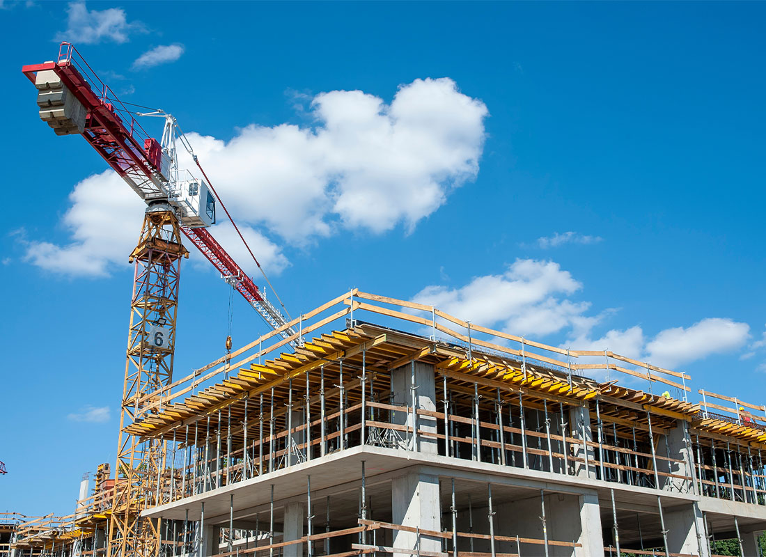 Insurance by Industry - Apartment Building Under Construction on a Sunny Day